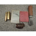 A dummy Grenade and Mortar Bomb along with two small brass Shell Cases one marked 1942, Infantry