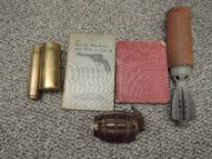 A dummy Grenade and Mortar Bomb along with two small brass Shell Cases one marked 1942, Infantry