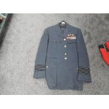 A RAF Group Captains Jacket & Trousers, all buttons present, RAF cloth badge with three rows of