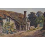 Lewis Mortimer, (19th/20th century), a watercolour, thatched country cottage, signed and dated 1920,