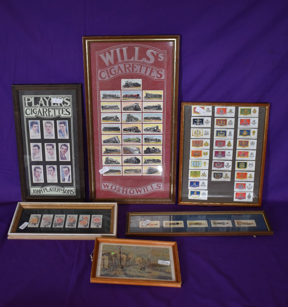 An assorted collection of framed cigarette cards, comprising Player's regiments, coats of arms, - Image 2 of 4