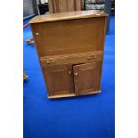 A vintage golden oak Ercol style bureau by Priory