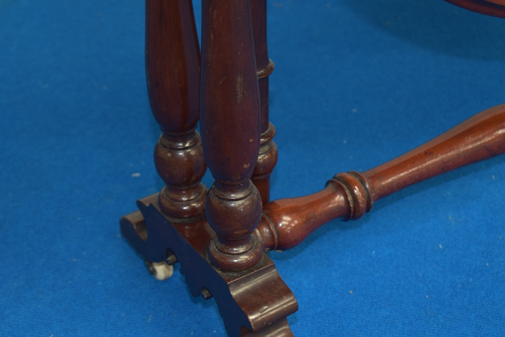 A Victorian mahogany Sutherland table, of traditional design with moulded demi-lune leaves and - Image 3 of 4