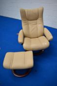 A Stressless recliner armchair and foot stool
