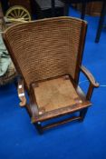 An early 20th century Orkney armchair of smaller proportions , bearing Liberty's label , width