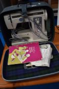 A vintage sewing machine Jones 865 , with case
