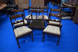 A set of six 19th Century mahogany rail back dining chairs and a similar scroll end carver chair