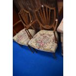 A pair of reproduction Hepplewhite style dining chairs