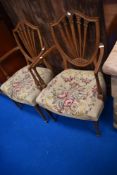 A pair of reproduction Hepplewhite style dining chairs