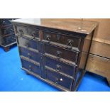 A Period oak chest of drawers in the Jacobean style having two short over three long drawers with