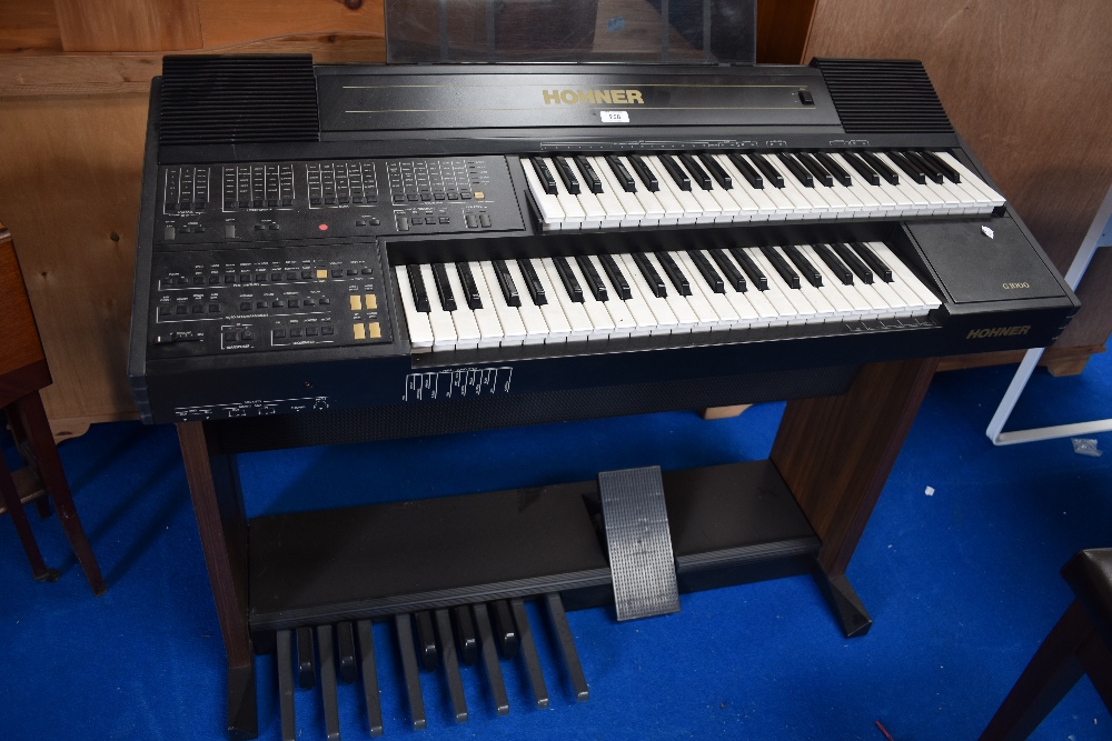 A modern Hohner G1000 electric organ.