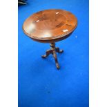 A modern yew effect circular occasional table, diameter approx. 50cm