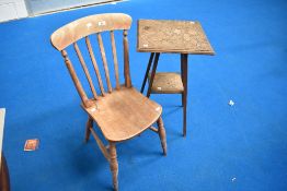 A 19th Century solid seat kitchen chair and a pokerwork plant stand