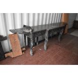 A large Victorian stained and carved oak mirror back sideboard, the mirror back with profuse scroll,