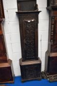 An 18th Century carved oak clock longcase, no movement or hood