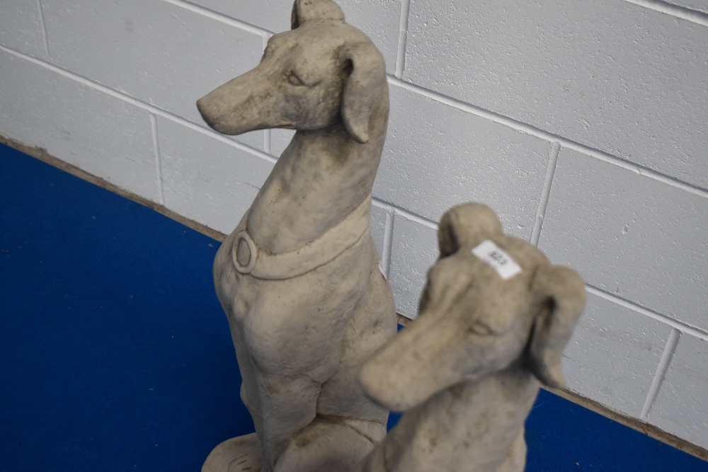 A pair of cast composite garden ornaments, formed as seated Greyhounds, one with damage to one ear - Image 3 of 5