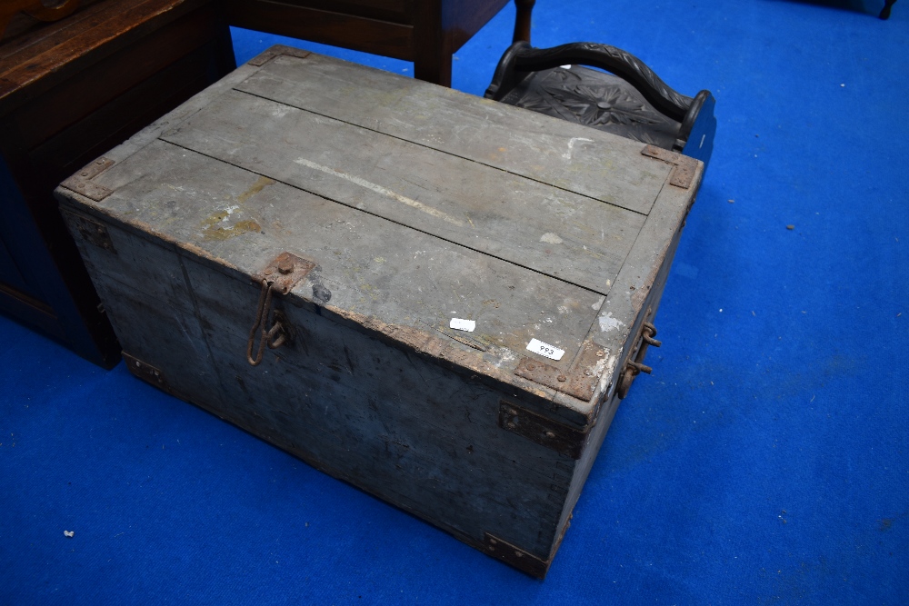 A rustic wooden tool chest