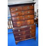 An 18th Century and later mahogany and oak chest on chest , having two over three drawers to top