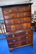 An 18th Century and later mahogany and oak chest on chest , having two over three drawers to top