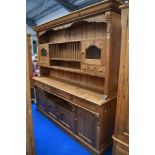 A rustic pine kitchen dresser , width approx. 214cm, height 210cm