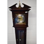 A reproduction short case clock