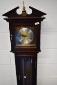A reproduction short case clock