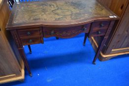 An Edwardian mahogany ladies writing desk in the Sheraton style having typical satinwood inlay