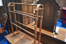 A Victorian stained frame towel rail, some historical worm