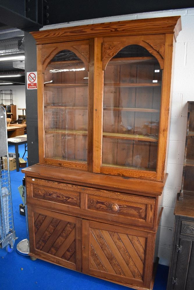 A Victorian pitch pine secretaire bookcase