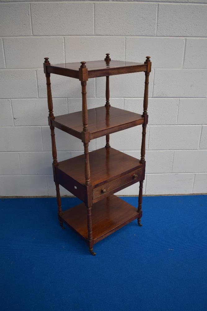 A 19th century mahogany four tier whatnot, one with cockbeaded drawer, all raised in turned supports