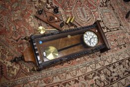 A 19th Century Vienna style mahogany cased wall clock