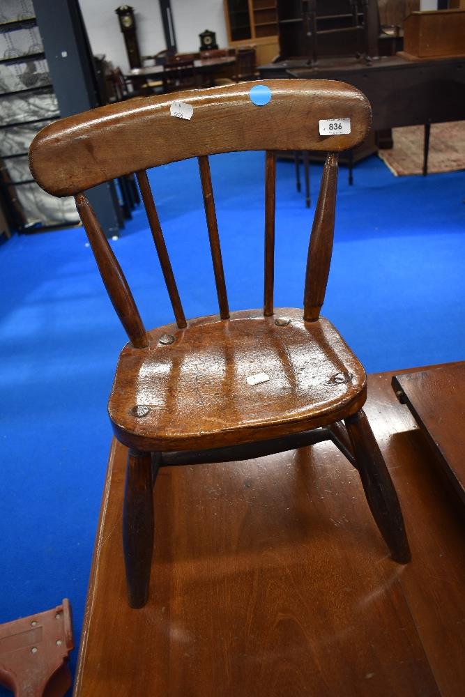 A traditional child's kitchen chair