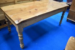 A modern pine kitchen dining table, in the traditional farmhouse style, approx. 183 x 89cm
