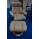 A Stressless style easy chair and footstool in cream leather