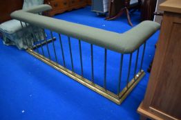 A Victorian brass club fender having later upholstered cushioned rail, internal measurements - width