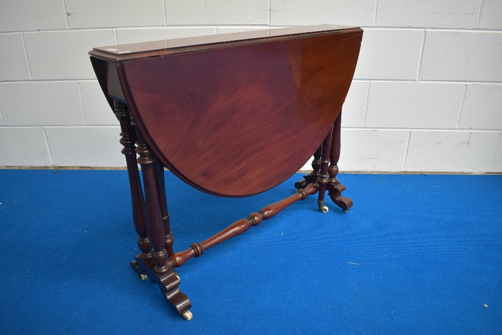 A Victorian mahogany Sutherland table, of traditional design with moulded demi-lune leaves and - Image 2 of 4