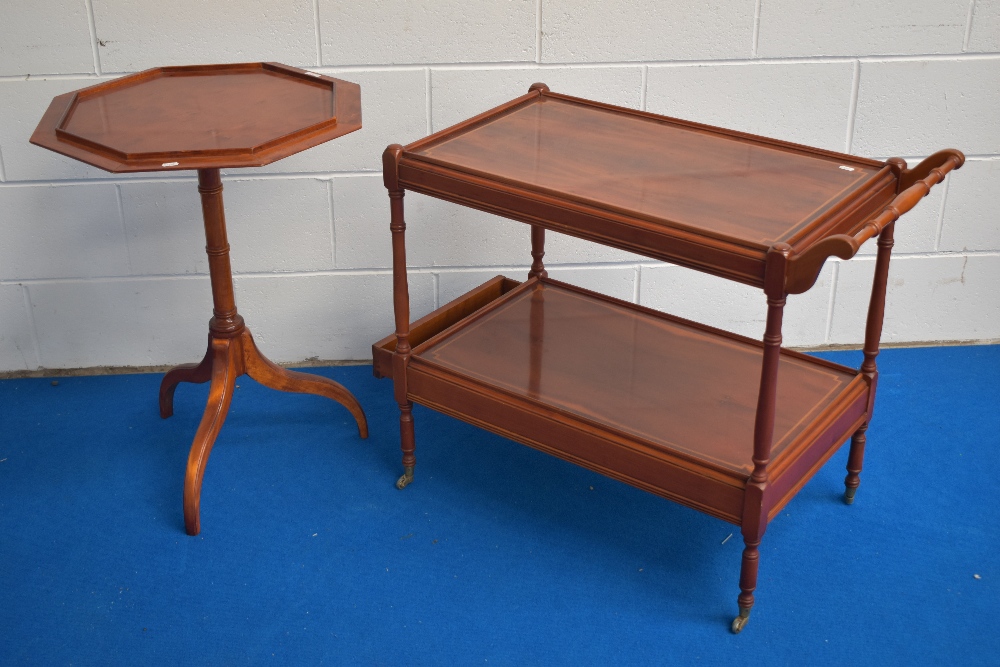 A 20th century Yew wood haxagonal wine table with a Yew wood drinks and cocktail trolley.