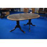 An early 20th Century Regency revival D end dining table with additional leaf
