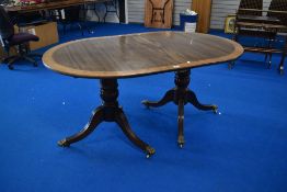 An early 20th Century Regency revival D end dining table with additional leaf