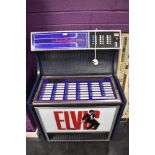 A vintage decorative Elvis themed Juke Box cabinet with workings removed and containing Panasonic CD