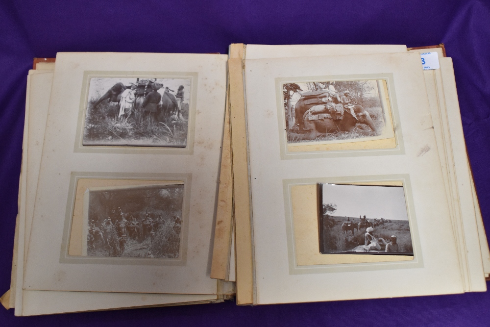 A 19th/20th Century photograph album with various assorted photographs illustrating visits to