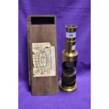 A Victorian brass optical instrument, in original wooden box, labelled TB Winter