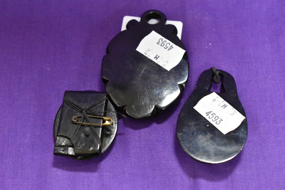 Three 19th Century painted pendant miniatures, mounted in Whitby jet - Image 2 of 2