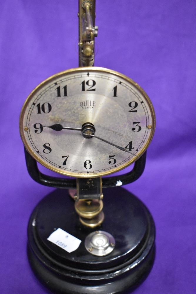 An early 20th Century Bulle electromagnetic clock having silver arabic dial, on ebonised base, - Image 2 of 3