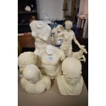 Six classically styled busts and studies, including woman with deer or similar on marble stand.