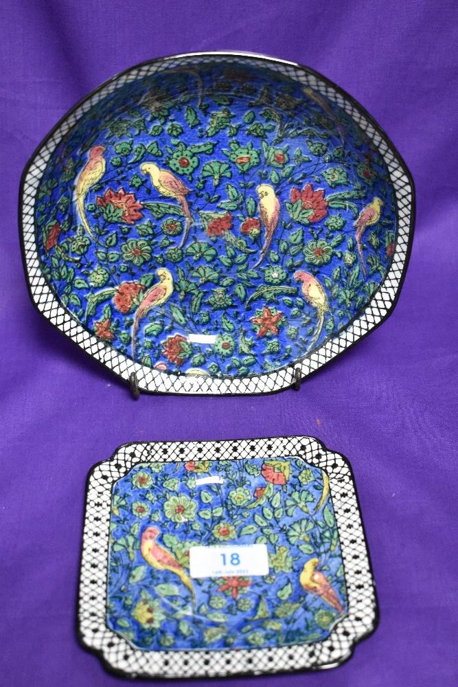 An early 20th Century Royal Doulton Persian design Parakeet bowl and a square form saucer of