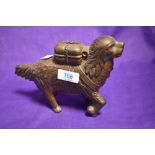 A vintage cast metal penny bank , modelled as a St Bernard rescue dog.