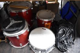 A four piece shell pack drum kit (no kick) with some stands etc, Pearl & Remo skins to the toms