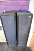 A set of four vintage column speakers, labelled KF