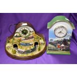 Two modern train themed clocks